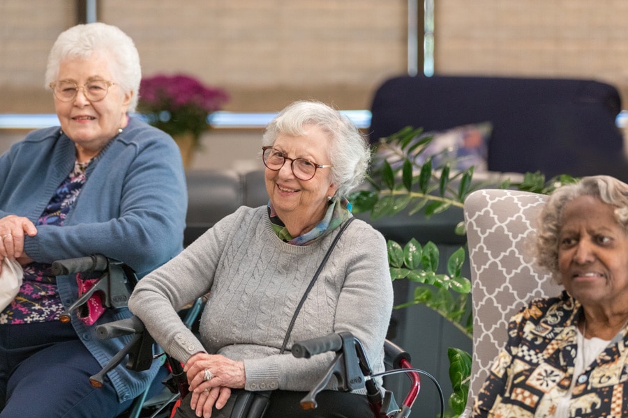 Three Female Residents Smiling And Looking Off To The Left Three Female Residents Smiling And Looking Off To The Left